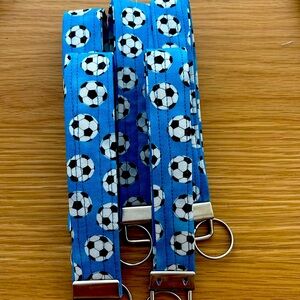 Small key fob, able to wear around the wrist comfortably.